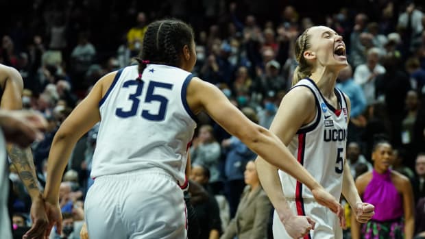 UConn's Page Bueckers reacts to a Huskies win.